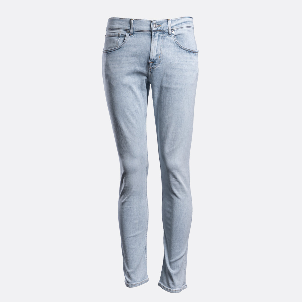 Light wash blue skinny jeans shown on a headless mannequin against a plain light gray background. 7 For All Mankind Jeans available at Sakks Menswear in Southampton.