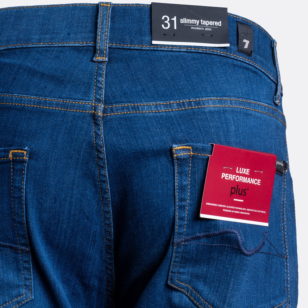 Slimmy Tapered Luxe Performance Plus High Jeans – Dark Blue