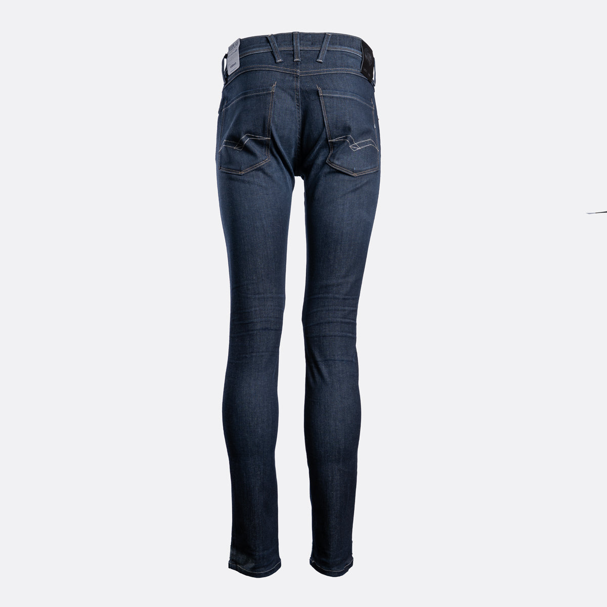Back view of dark blue slim-fit jeans on a light gray background. Replay Jeans available at Sakks Menswear in Southampton.