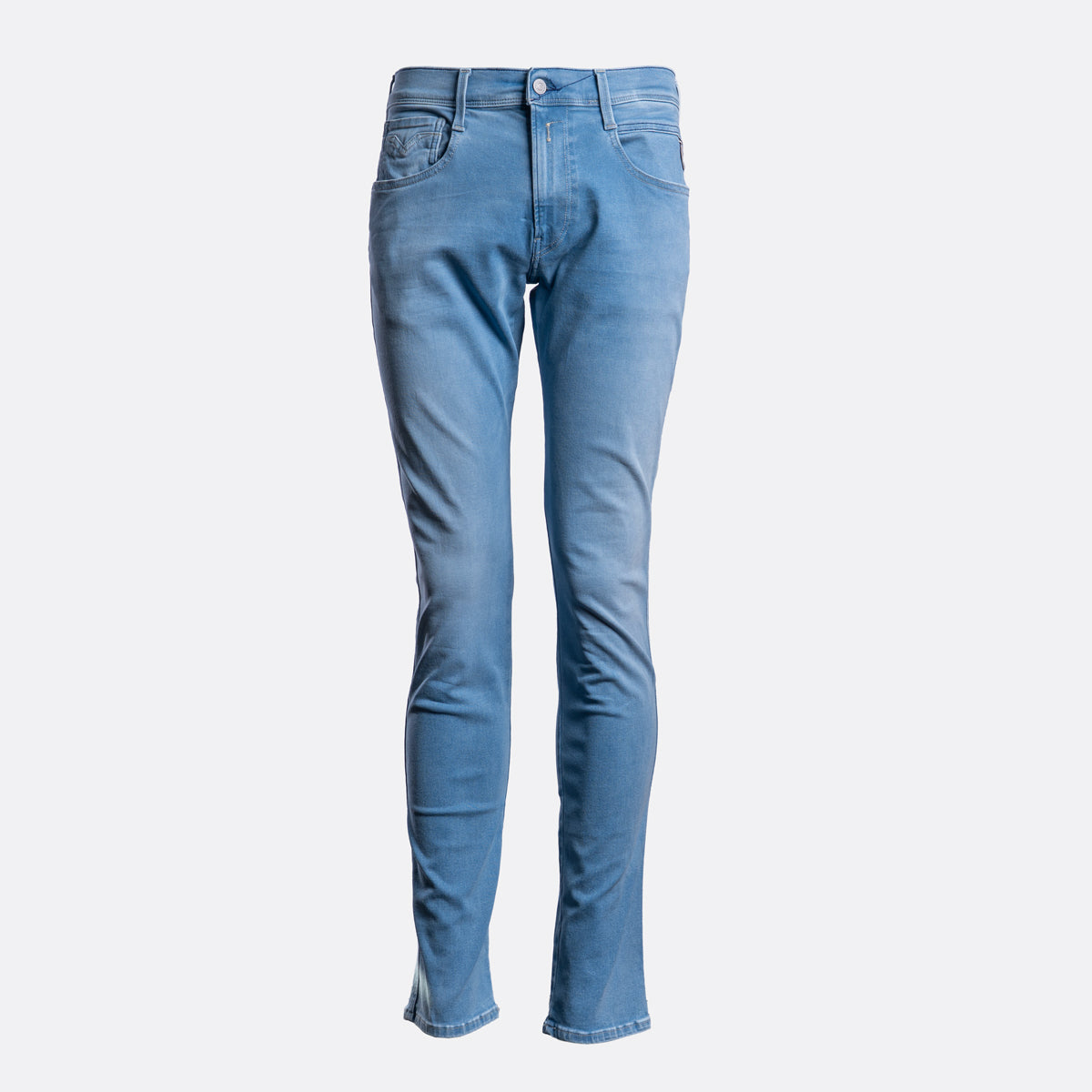 Light blue slim-fit denim jeans shown flat against a light gray background. Replay Jeans available at Sakks Menswear in Southampton.