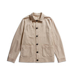 A light beige utility jacket with a pointed collar, dark buttons, and two front patch pockets, displayed flat against a white background. Circolo 1901 Shirt Jacket available at Sakks Menswear in Southampton.