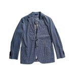 A blue textured blazer jacket by Circolo Roma, featuring a two-button front, notch lapels, and front flap pockets, laid flat against a white background. Circolo 1901 Blazer available at Sakks Menswear in Southampton.