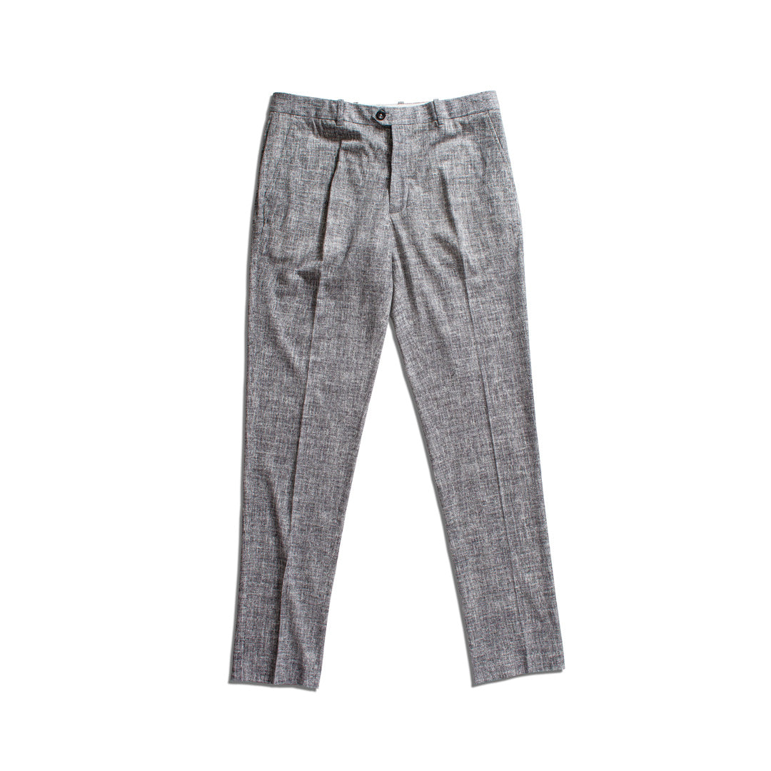 A pair of gray textured trousers with a subtle houndstooth or tweed pattern, shown flat against a solid white background. Circolo 1901 Trousers available at Sakks Menswear in Southampton.