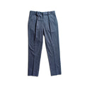 A pair of blue pleated trousers laid flat against a solid white background. Circolo 1901 Trousers available at Sakks Menswear in Southampton.