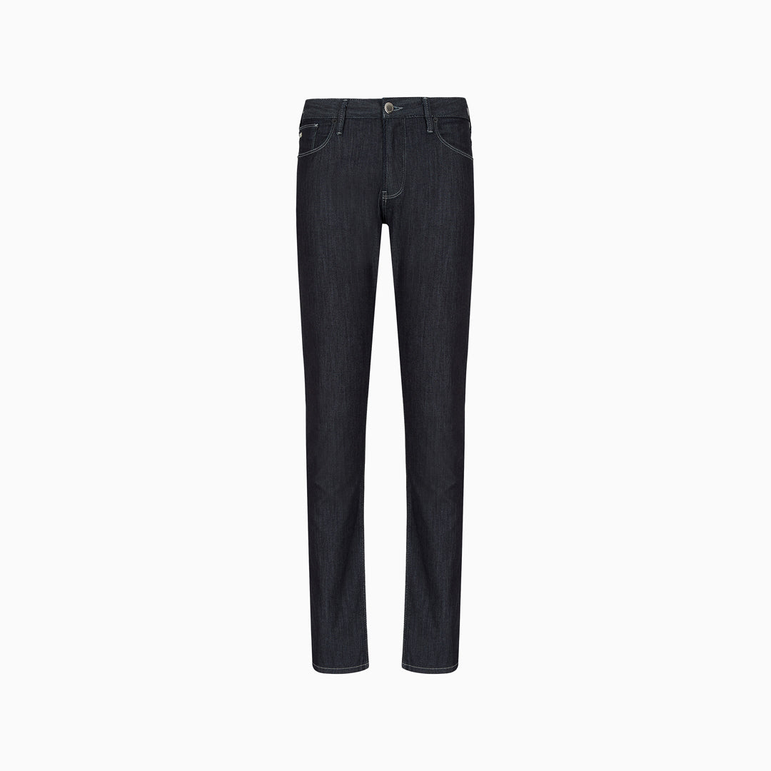 Dark wash slim-fit jeans shown flat against a plain white background. Emporio Armani Jeans. Sakks Menswear Southampton.