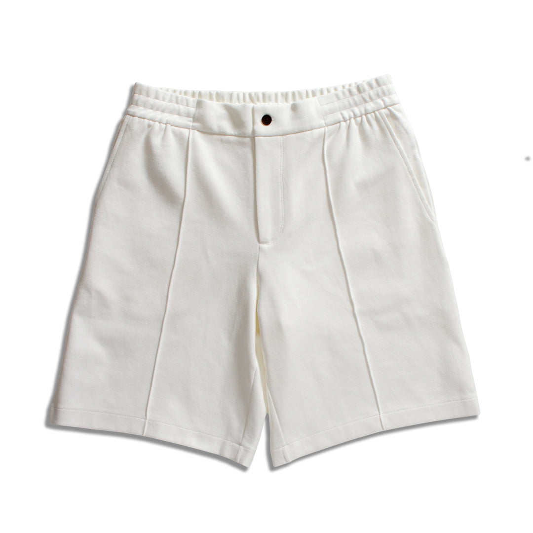 Off-white pleated shorts with an elastic waistband and a single button closure, shown flat on a white background. Emporio Armani Shorts. Sakks Menswear Southampton.