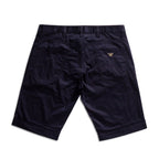 Dark navy blue chinos shorts shown from the back, featuring a belt loop, two rear patch pockets, and a small gold embroidered eagle logo on the right pocket, set against a plain white background. Emporio Armani Shorts. Sakks Menswear Southampton.