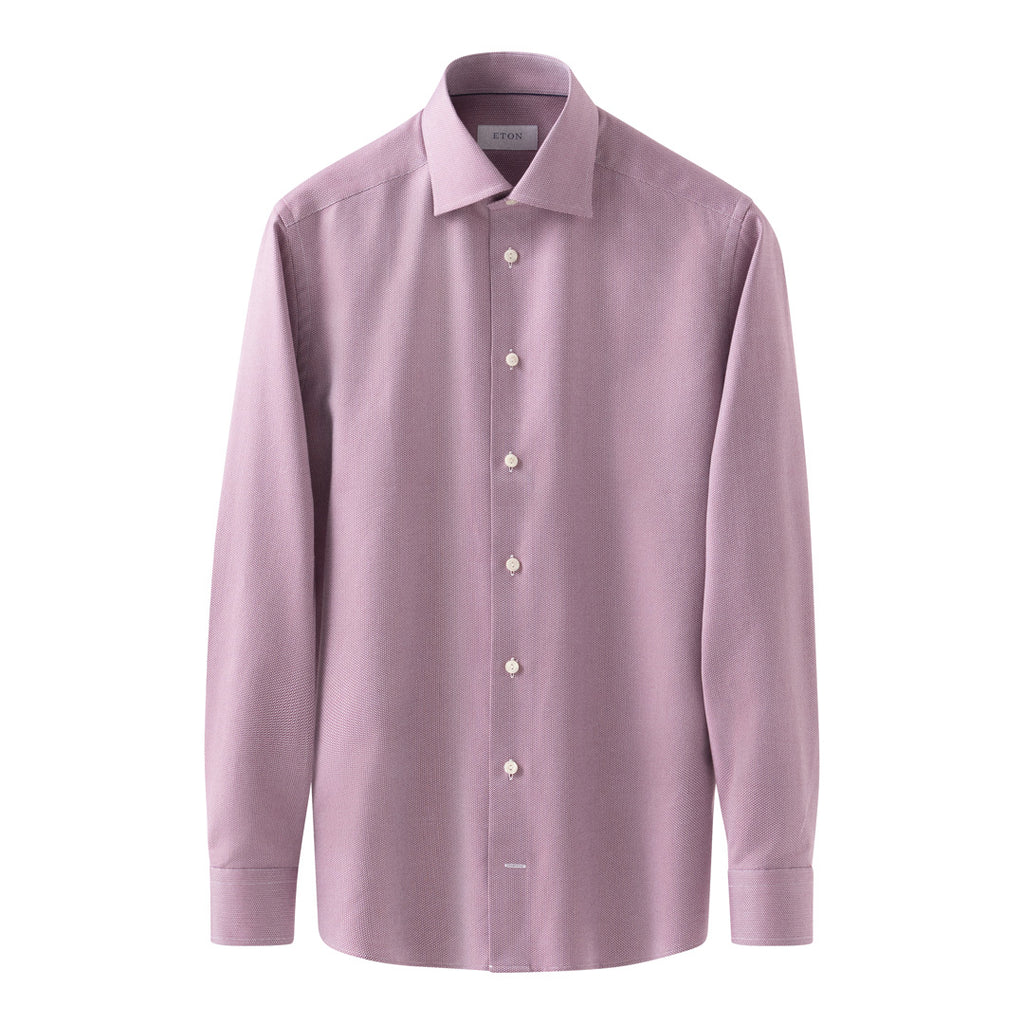 A light pink long-sleeve button-down dress shirt with a pointed collar, shown on a plain white background. Eton Shirt available at Sakks Menswear in Southampton.