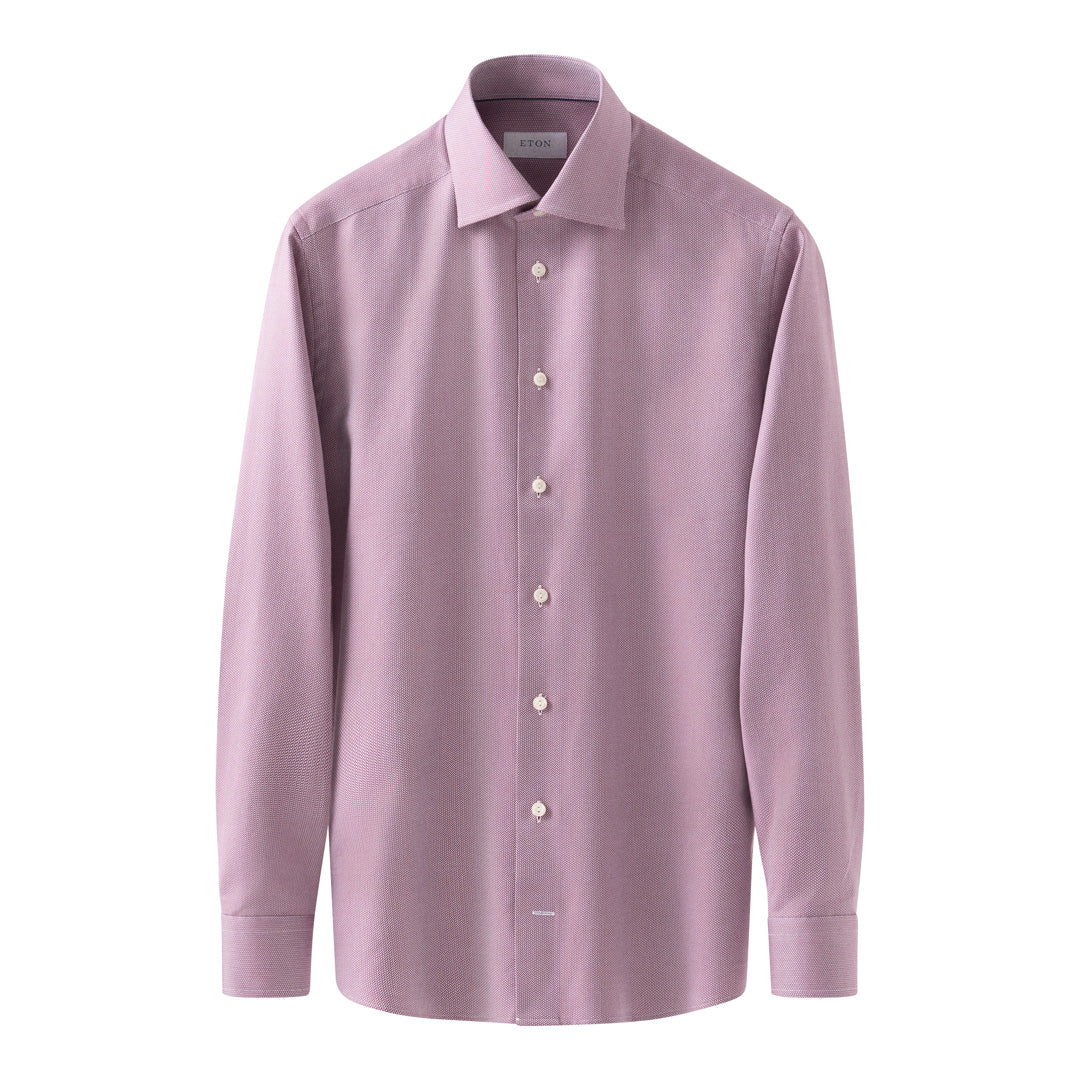 A light pink long-sleeve button-down dress shirt with a pointed collar, shown on a plain white background. Eton Shirt available at Sakks Menswear in Southampton.