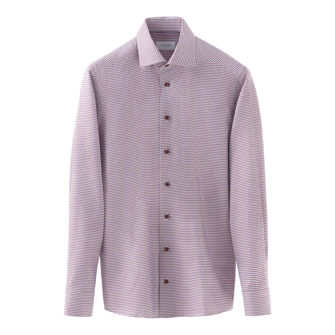 A long-sleeve button-down dress shirt with a fine horizontal stripe pattern in pink and white, featuring dark brown buttons and a classic collar. Eton Shirt available at Sakks Menswear in Southampton.