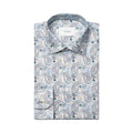 A folded men's dress shirt with a blue, gray, and beige paisley pattern, featuring a white neck label with the brand name ETON. Eton shirt available at Sakks Menswear in Southampton.
