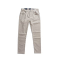 A pair of light beige slim-fit jeans shown flat against a solid white background. 7 For All Mankind Chinos available at Sakks Menswear in Southampton.