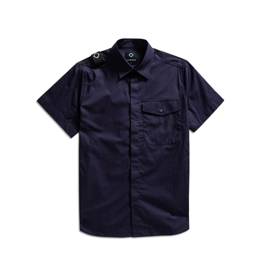 A dark navy blue short-sleeve button-up shirt with a chest pocket and shoulder epaulets, displayed flat against a white background. MA.Strum Short Sleeve Shirt available at Sakks Menswear in Southampton.