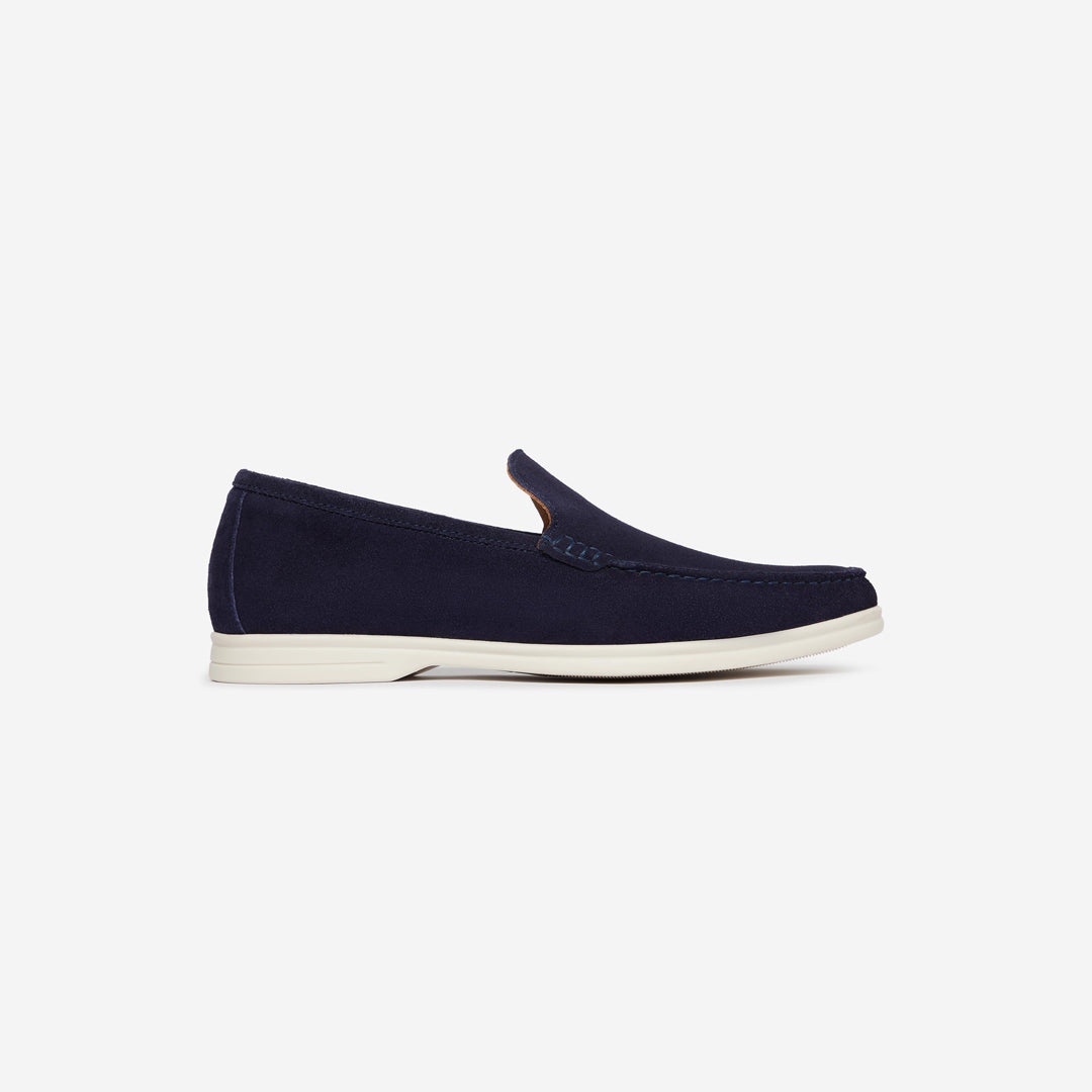 Navy blue textured clutch bag with gold clasp on a white background. Oliver Sweeney Loafers available at Sakks Menswear in Southampton.