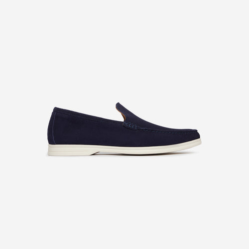 Navy blue textured clutch bag with gold clasp on a white background. Oliver Sweeney Loafers available at Sakks Menswear in Southampton.