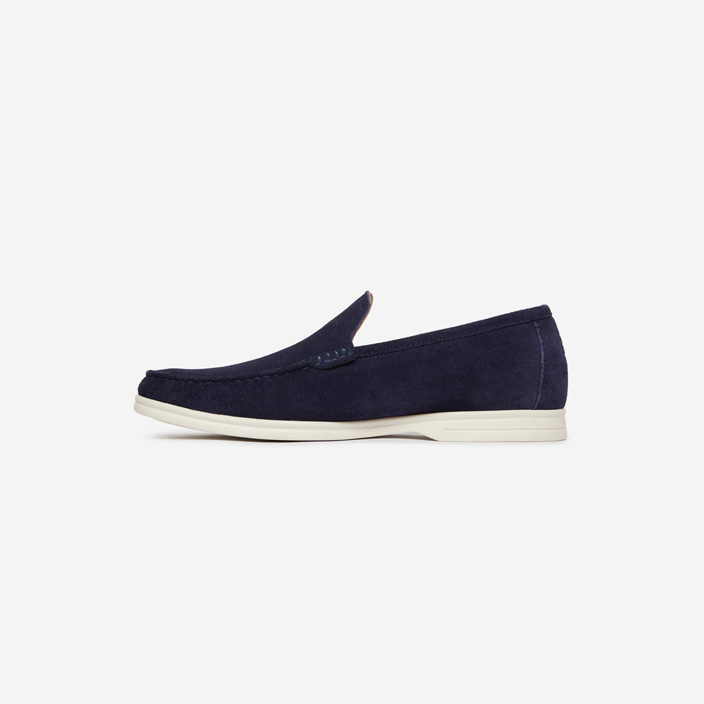 Black leather wallet on a white background. Oliver Sweeney Loafers available at Sakks Menswear in Southampton.