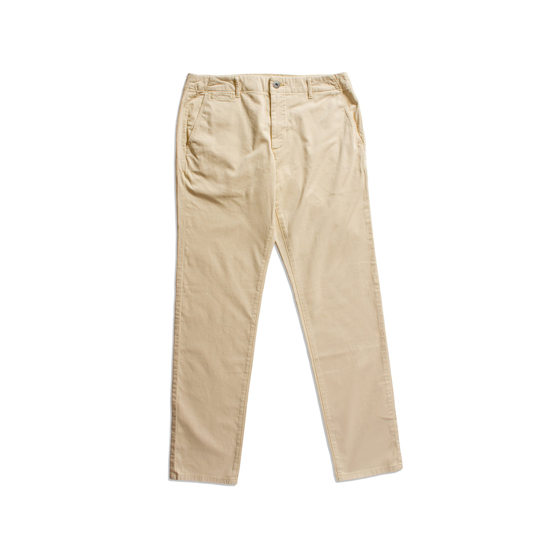 A pair of beige chino pants shown flat against a solid white background. PAIGE Chinos available at Sakks Menswear in Southampton.