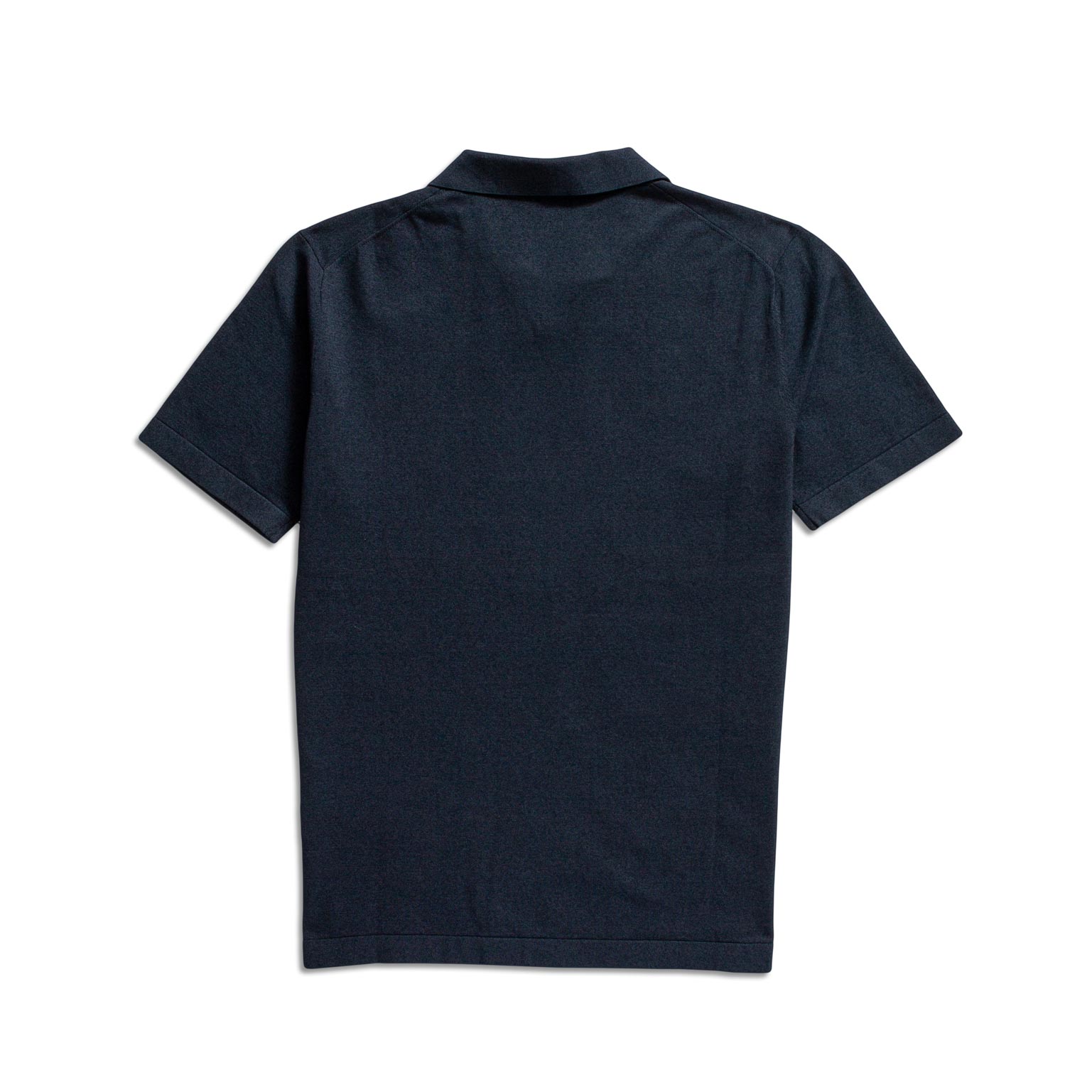 A dark navy blue short-sleeve polo shirt shown from the back, laid flat against a solid white background. Thomas Maine Polo available at Sakks Menswear in Southampton.