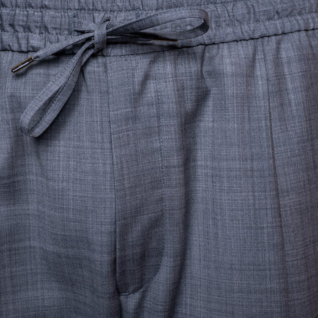 Close-up of gray textured drawstring shorts showing the fabric weave and waistband. Briglia Trousers. Sakks Menswear Southampton.