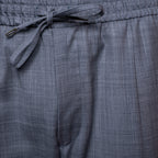 Close-up of gray textured drawstring shorts showing the fabric weave and waistband. Briglia Trousers. Sakks Menswear Southampton.