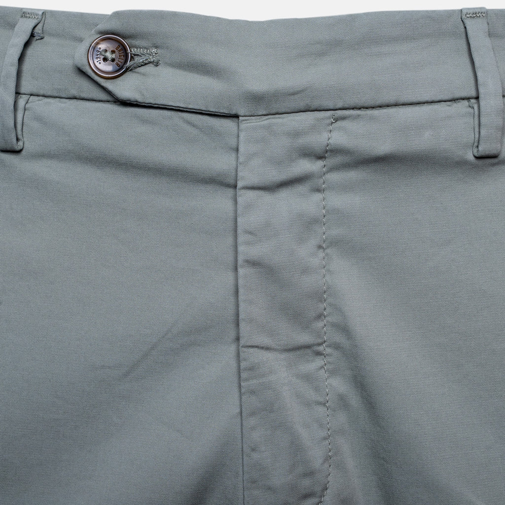 Close-up of the waistband of sage trousers, showing belt loops, a button closure, and front seam stitching. Briglia Trousers. Sakks Menswear Southampton.