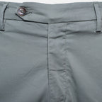 Close-up of the waistband of sage trousers, showing belt loops, a button closure, and front seam stitching. Briglia Trousers. Sakks Menswear Southampton.