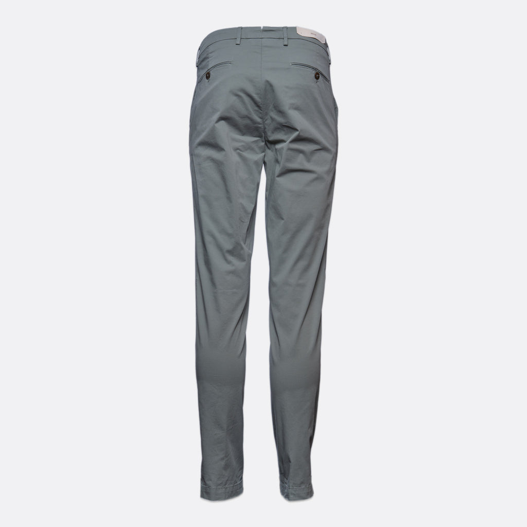 Sage slim-fit trousers shown from the back, featuring a button closure and belt loops, on a light grey background. Briglia Trousers. Sakks Menswear Southampton.