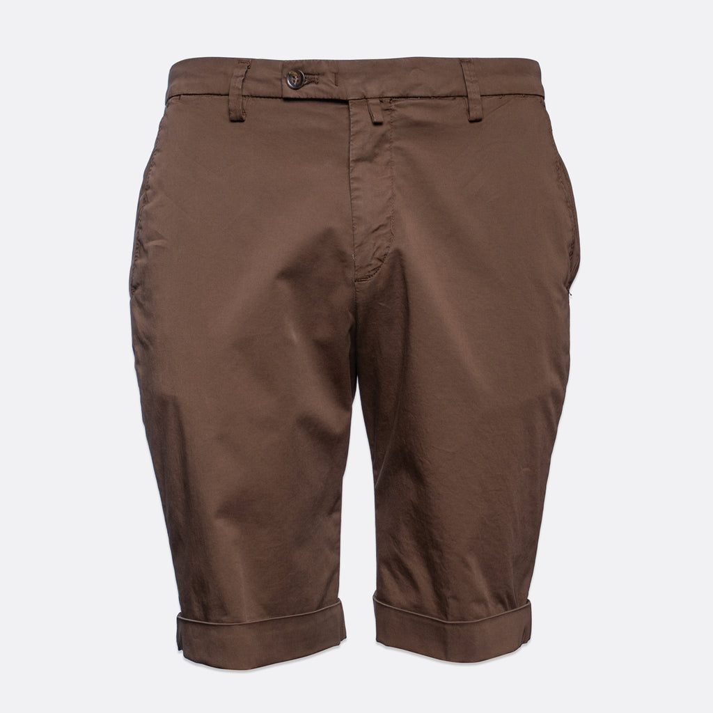 A pair of brown chino shorts with rolled cuffs, shown against a plain light gray background. Briglia Bermuda Shorts. Sakks Menswear Southampton.