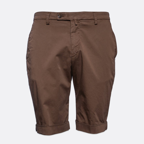 A pair of brown chino shorts with rolled cuffs, shown against a plain light gray background. Briglia Bermuda Shorts. Sakks Menswear Southampton.