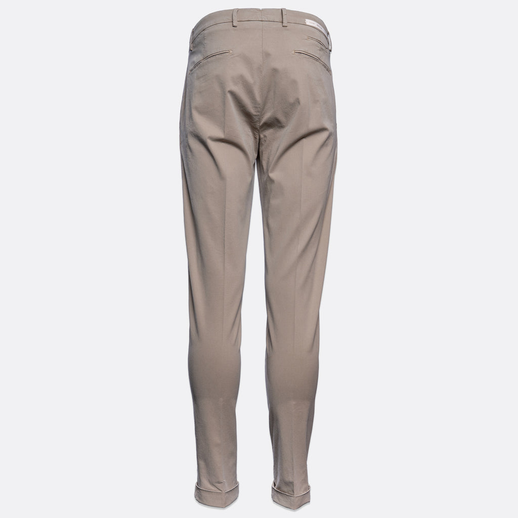 A pair of slim-fit trousers shown from the back, in a solid taupe-beige colour, displayed on a clean white background. Briglia Trousers. Sakks Menswear Southampton.