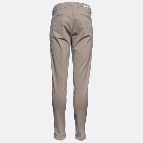 A pair of slim-fit trousers shown from the back, in a solid taupe-beige colour, displayed on a clean white background. Briglia Trousers. Sakks Menswear Southampton.