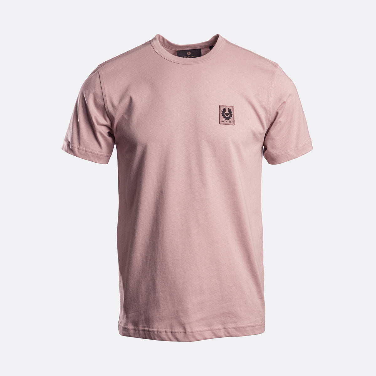 A dusty pink short-sleeve crewneck t-shirt with a small embroidered patch on the left chest, displayed on a clean white background. Belstaff T-Shirt. Sakks Menswear Southampton.