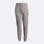 A pair of light gray sweatpants with a drawstring waist, side pockets, and ribbed cuffs, shown against a light gray background. Belstaff Sweat Pants. Sakks Menswear Southampton.