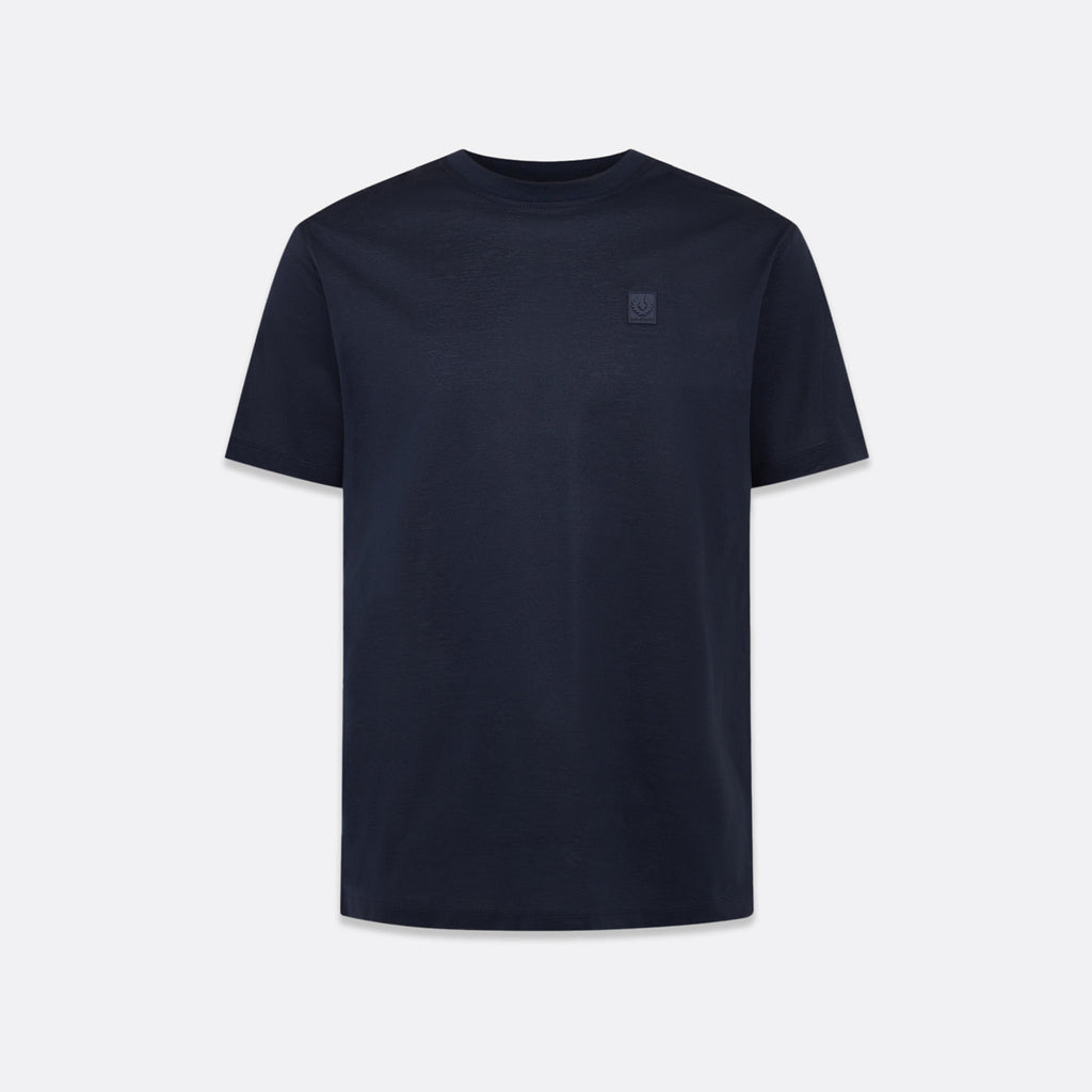 A dark navy blue short-sleeve crewneck t-shirt with a small tonal embroidered square logo on the left chest, displayed against a light gray background. Belstaff T-Shirt. Sakks Menswear Southampton.