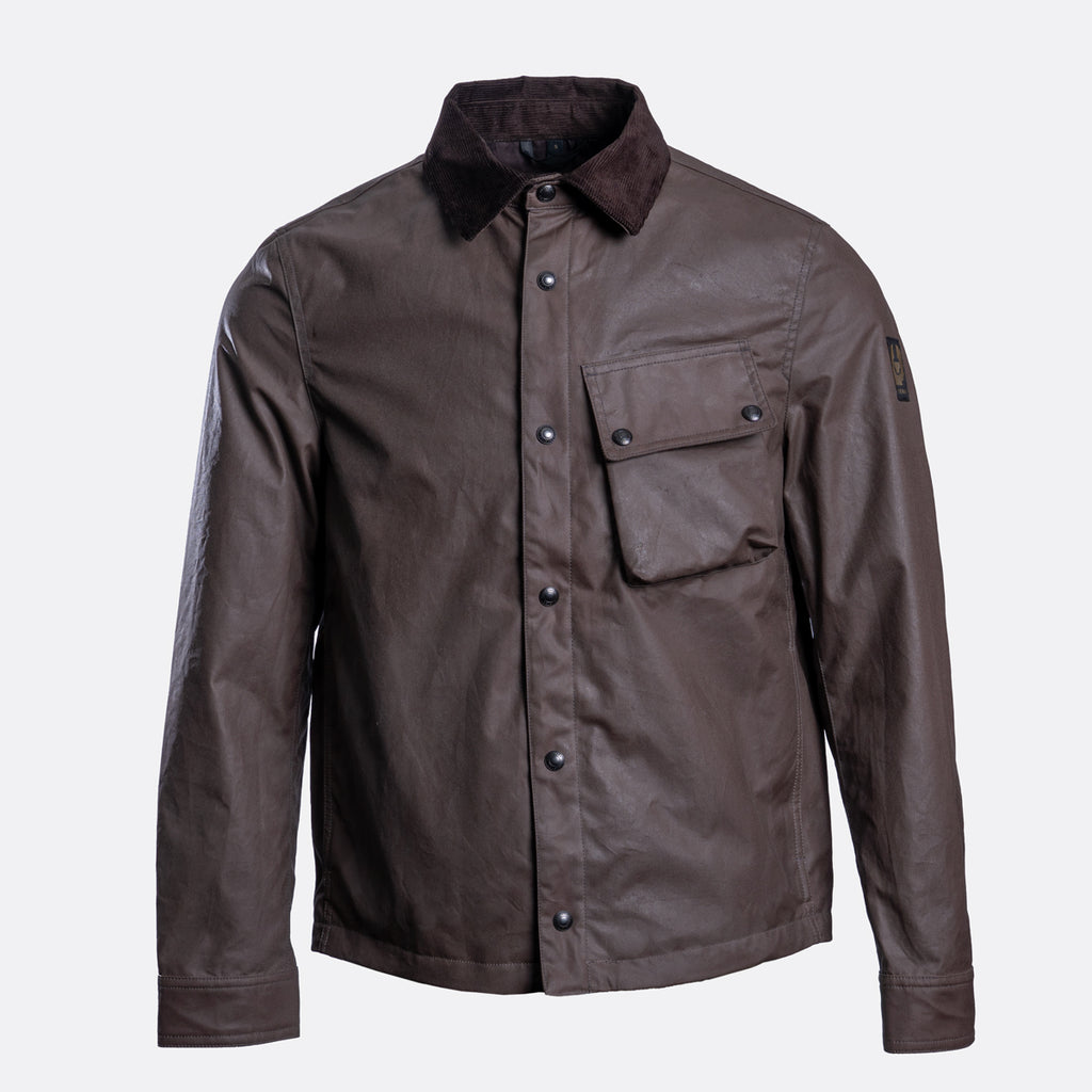 A dark brown waxed cotton button-up shirt jacket with a contrasting dark brown corduroy collar, a chest flap pocket, and button cuffs, shown on a light gray background. Belstaff Jacket. Sakks Menswear Southampton.