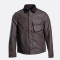 A dark brown waxed cotton button-up shirt jacket with a contrasting dark brown corduroy collar, a chest flap pocket, and button cuffs, shown on a light gray background. Belstaff Jacket. Sakks Menswear Southampton.