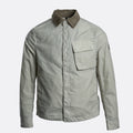 A light gray utility shirt jacket with a contrasting brown corduroy collar, featuring a button-up front, a chest pocket with a snap flap, and button cuffs. Belstaff Jacket. Sakks Menswear Southampton.