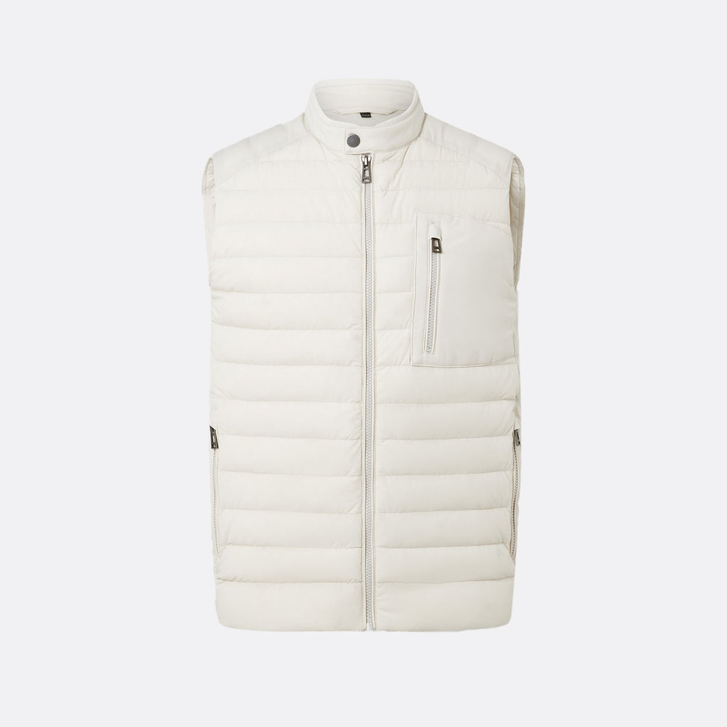 An off-white quilted puffer vest with a full-zip front, stand-up collar, and a vertical zippered chest pocket, shown against a light gray background. Belstaff Gilet. Sakks Menswear Southampton.