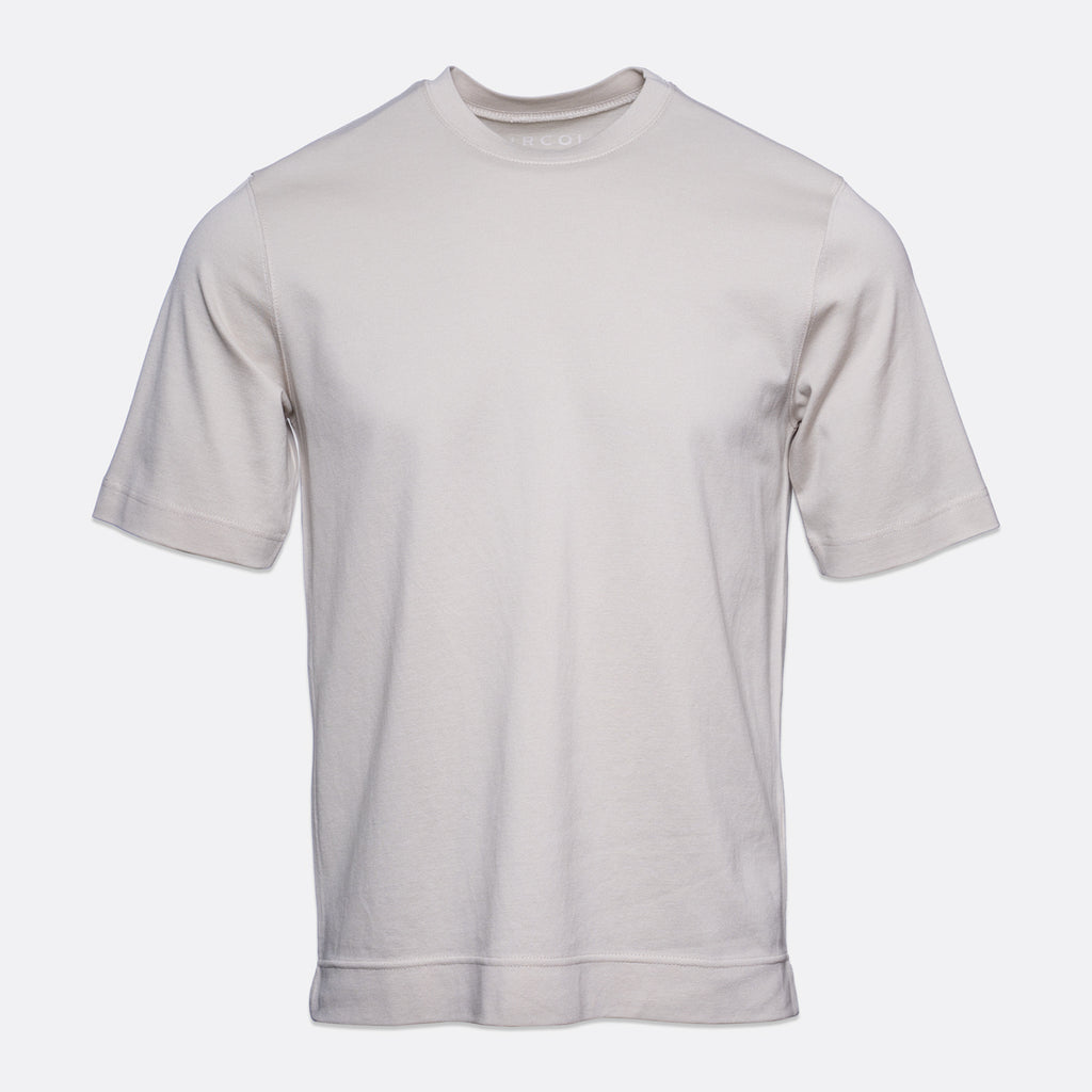 A light beige crew-neck t-shirt with short sleeves, displayed on a clean, light gray background. Circolo 1901 T-Shirt. Sakks Menswear Southampton.
