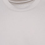 Close-up of a light beige crew-neck t-shirt showing the ribbed collar and the brand name 'CIRCOLO' printed inside. Circolo 1901 T-Shirt. Sakks Menswear Southampton.