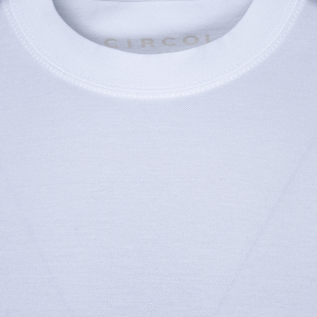 Close-up of a white crew-neck t-shirt showing the inner neck label with the brand name CIRCOLO. Circolo 1901 T-Shirt. Sakks Menswear Southampton.