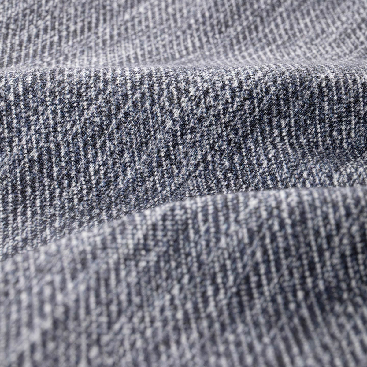 Close-up of a heathered gray knit fabric texture with soft folds and a ribbed weave. Circolo 1901 Blazer. Sakks Menswear Southampton.