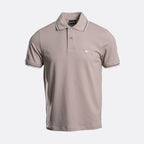 A short-sleeve polo shirt in taupe with white contrast piping on the collar and sleeve cuffs, featuring a two-button placket and a small white embroidered eagle logo on the left chest. The shirt is displayed on a clean, light grey background. Emporio Armani Polo. Sakks Menswear Southampton.