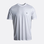 A white short-sleeve crewneck t-shirt with a small dark embroidered logo on the left chest, displayed on a light gray background. Emporio Armani T-Shirt. Sakks Menswear Southampton.