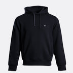 A black pullover hoodie with a small white embroidered eagle logo on the left chest, displayed on a clean light gray background. Emporio Armani Hoodie. Sakks Menswear Southampton.