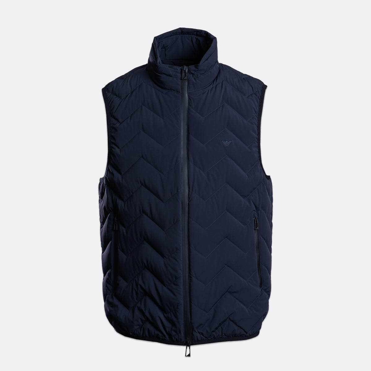 A navy blue sleeveless quilted puffer vest with a full front zipper and stand-up collar, shown against a light gray background. Emporio Armani Gilet. Sakks Menswear Southampton.