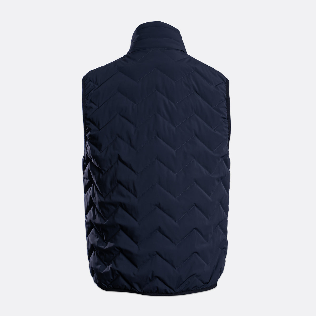 A dark navy blue quilted puffer vest shown from the back, featuring a high collar and a chevron quilted pattern, set against a plain light gray background. Emporio Armani Gilet. Sakks Menswear Southampton.