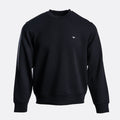 A black crewneck sweatshirt with a small white embroidered eagle logo on the left chest, displayed on a clean light gray background. Emporio Armani Sweatshirt. Sakks Menswear Southampton.