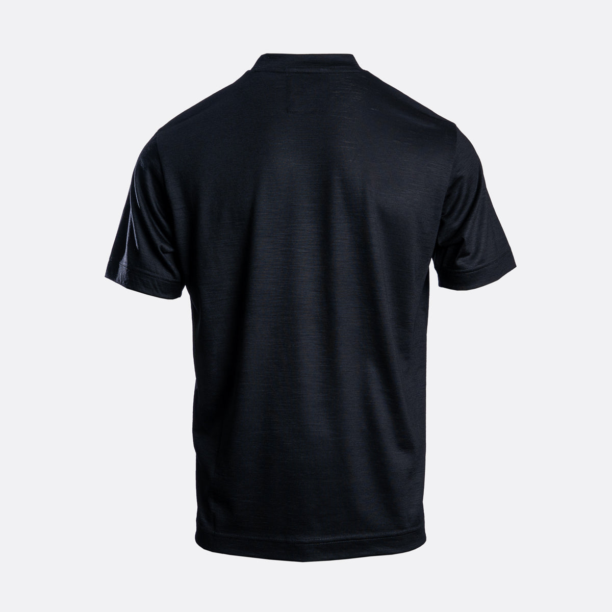 A black short-sleeve athletic t-shirt shown from the back, displayed on a clean, light gray background. Emporio Armani T-Shirt. Sakks Menswear Southampton.