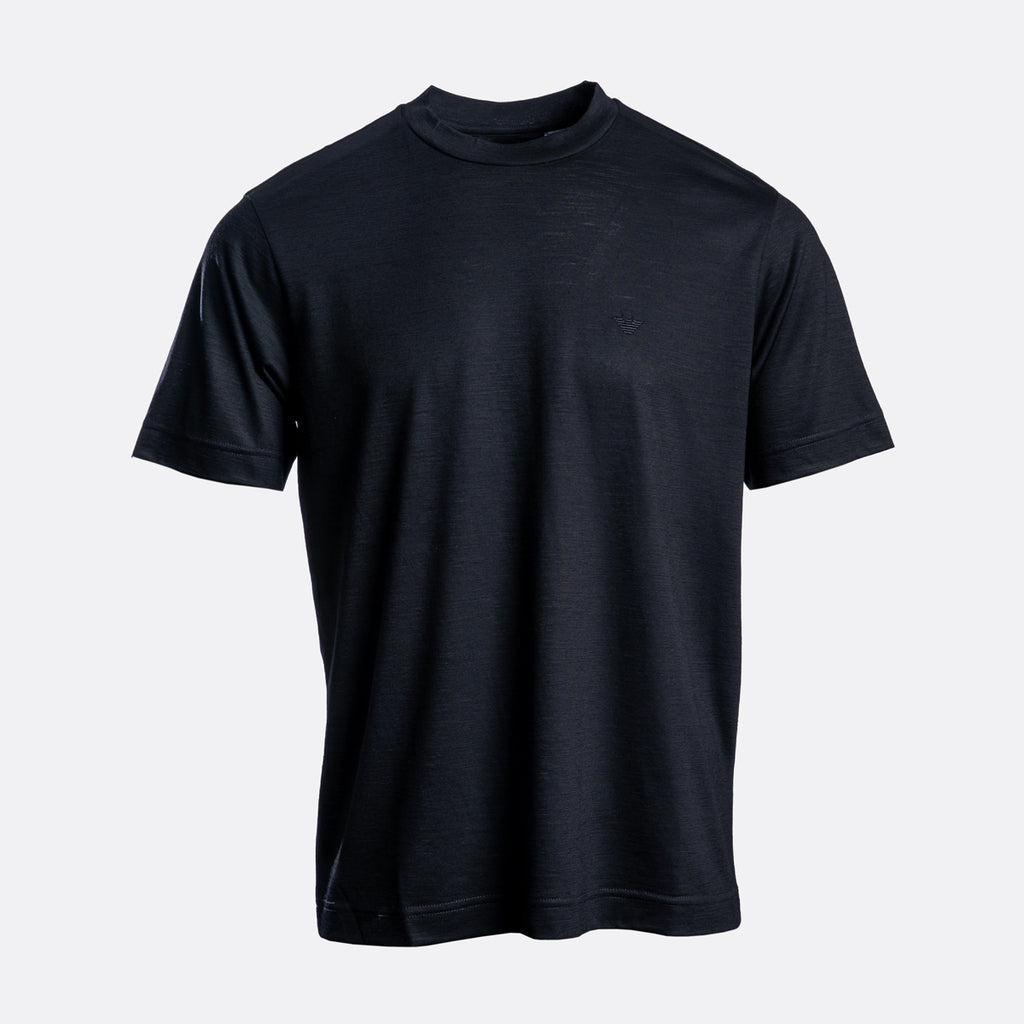 A dark navy blue short-sleeve crewneck t-shirt displayed on a light gray background. Emporio Armani T-Shirt. Sakks Menswear Southampton.